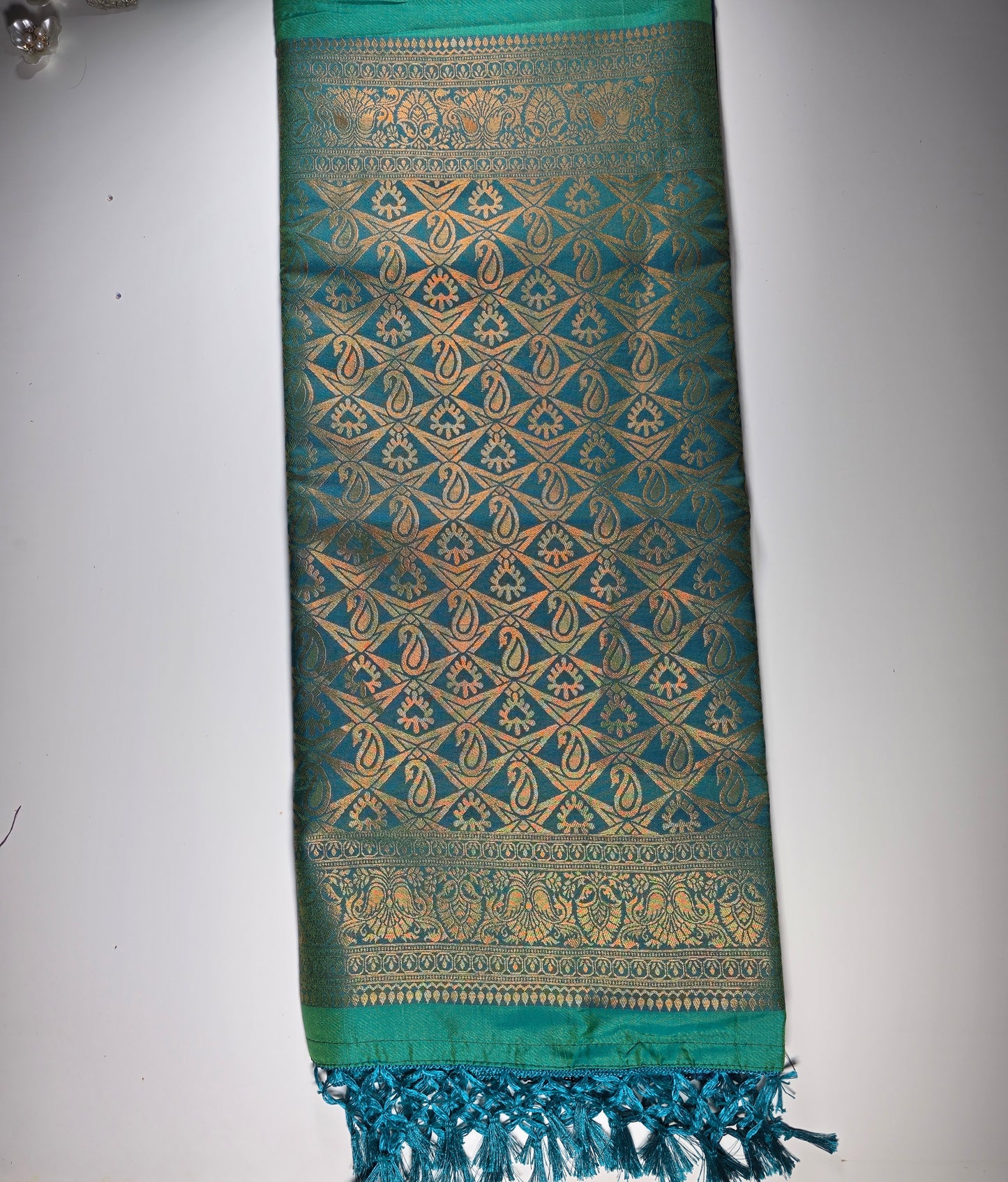 Teal blue leaf green soft silk saree