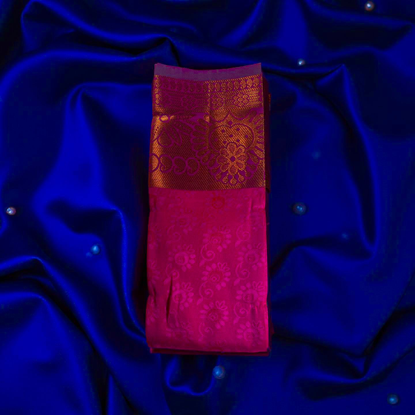 "Regal Kuberapattu: Pink Body with Purple Border, Copper Zari, and Green Pallu"