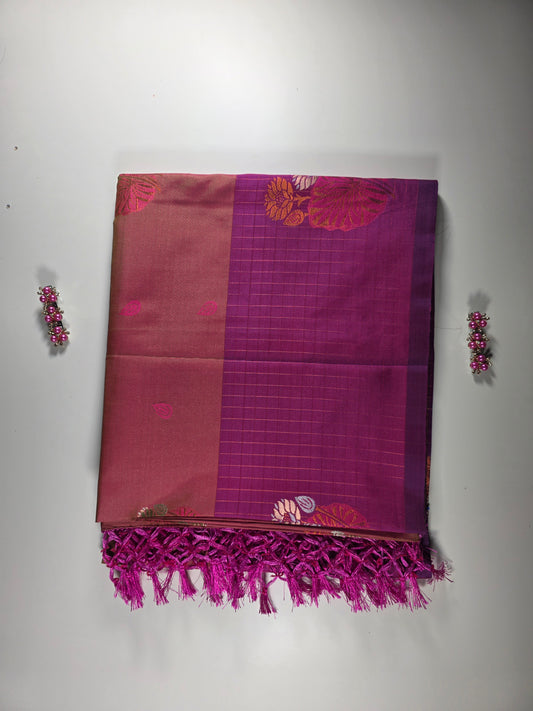 orange  silk  saree with royal pink border.