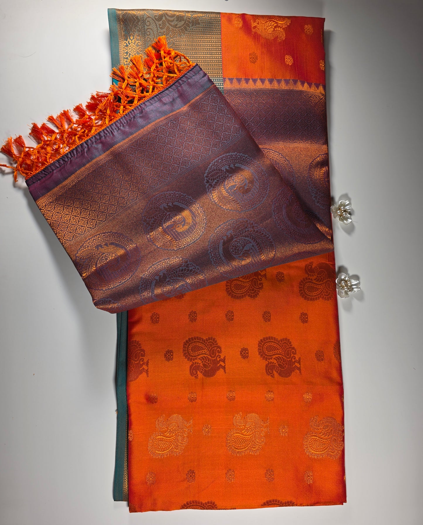 Radiant Orange Soft Silk Saree with Rich Forest Green Border