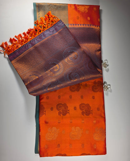 Radiant Orange Soft Silk Saree with Rich Forest Green Border