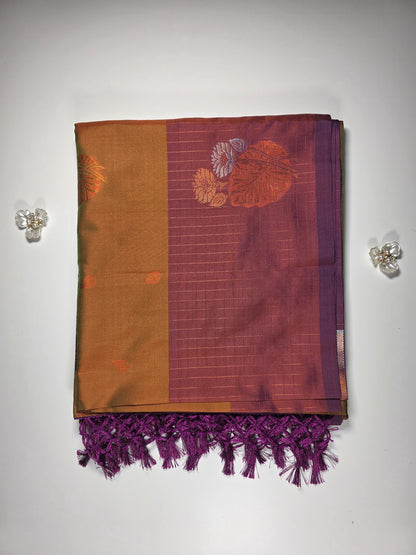 Mustard yellow saree with royal purple border.