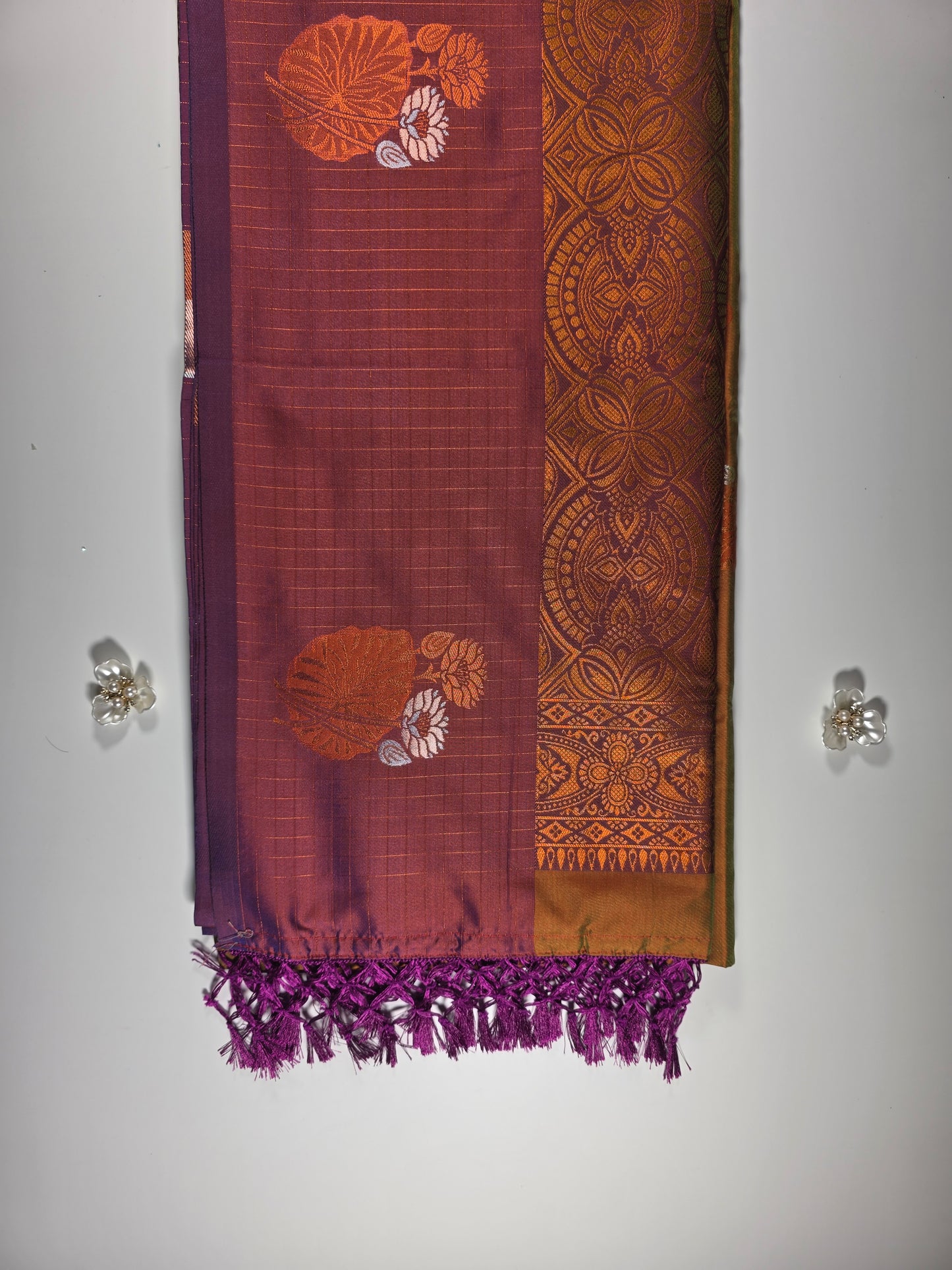 Mustard yellow saree with royal purple border.