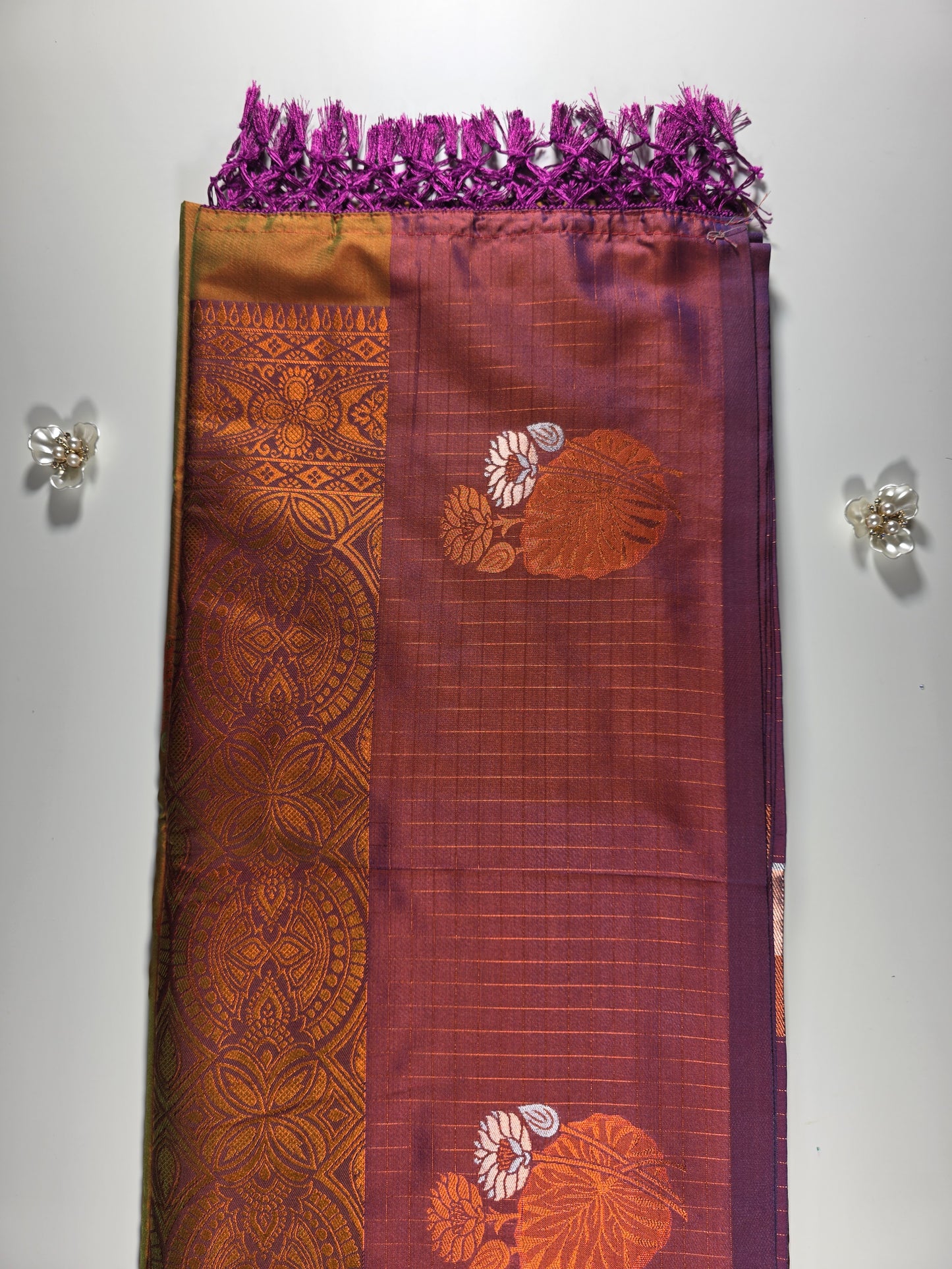Mustard yellow saree with royal purple border.