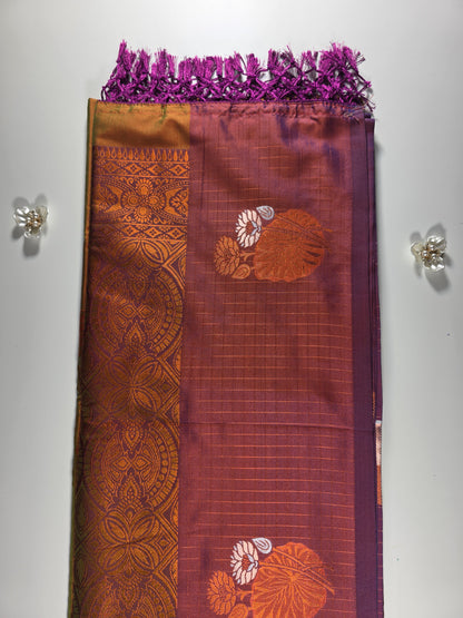 Mustard yellow saree with royal purple border.