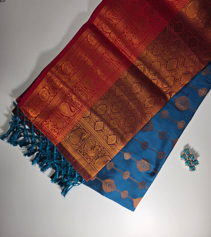 Exquisite Dakshini Pattu Saree: Vibrant Peacock Blue Body with Ornate Maroon Border and Gold Zari Weave