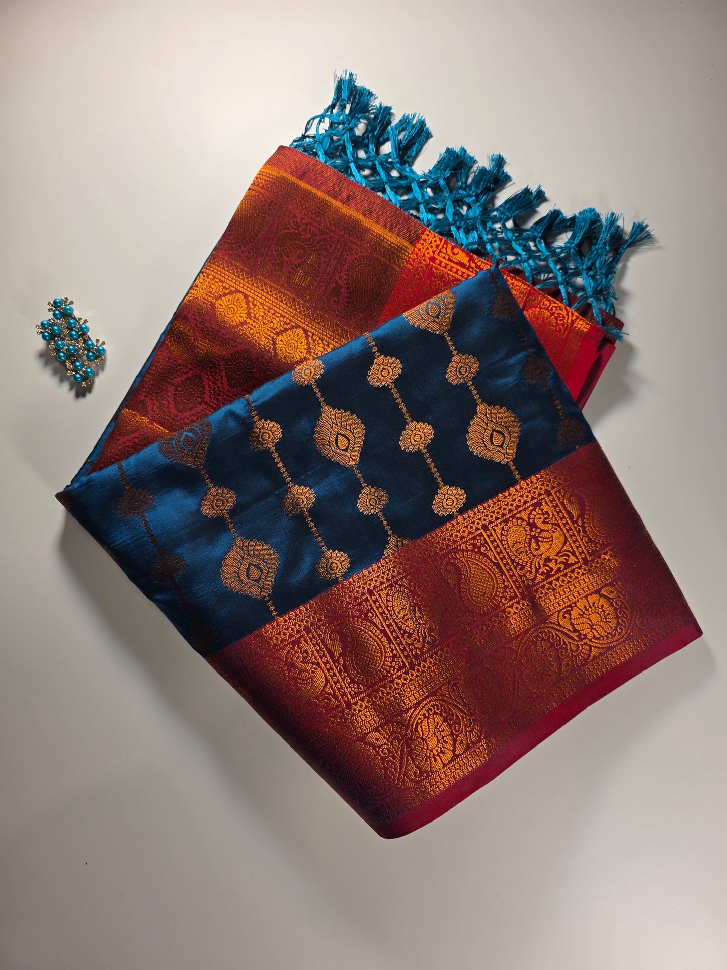 Exquisite Dakshini Pattu Saree: Vibrant Peacock Blue Body with Ornate Maroon Border and Gold Zari Weave