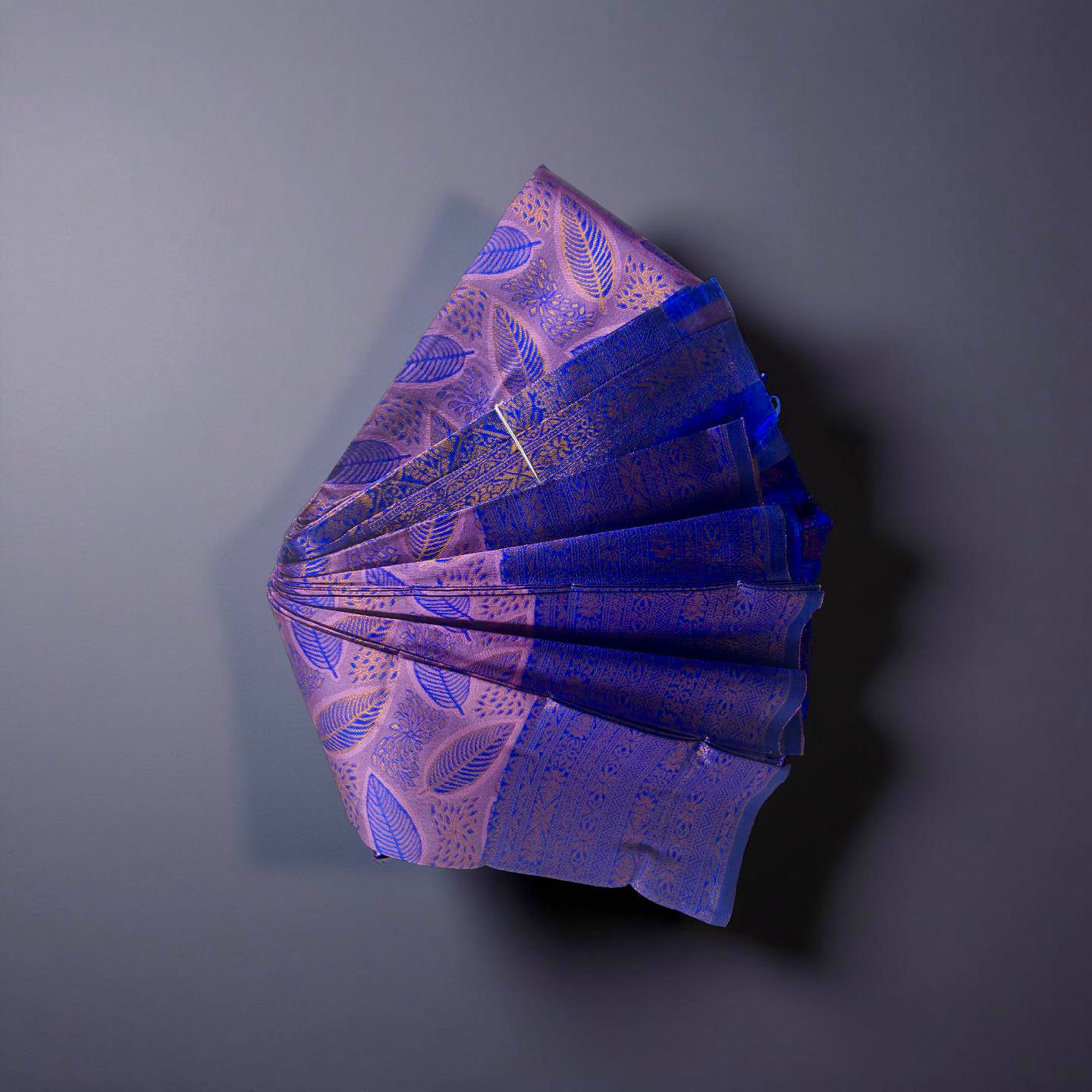 ''Regal Navy Blue & Violet Kubera Pattu Saree with Copper Zari Leaf Motifs"