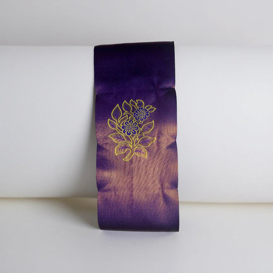 "Majestic Kuberapattu: Dark Purple Body with Mustard yellow Border and Copper Zari Floral Motifs"