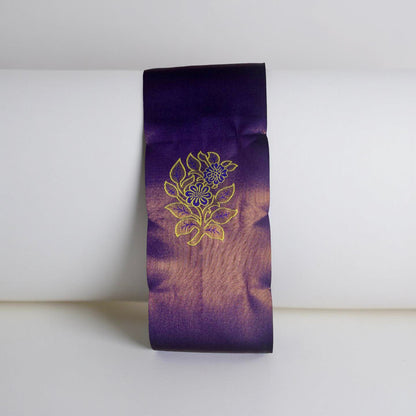 "Majestic Kuberapattu: Dark Purple Body with Mustard yellow Border and Copper Zari Floral Motifs"