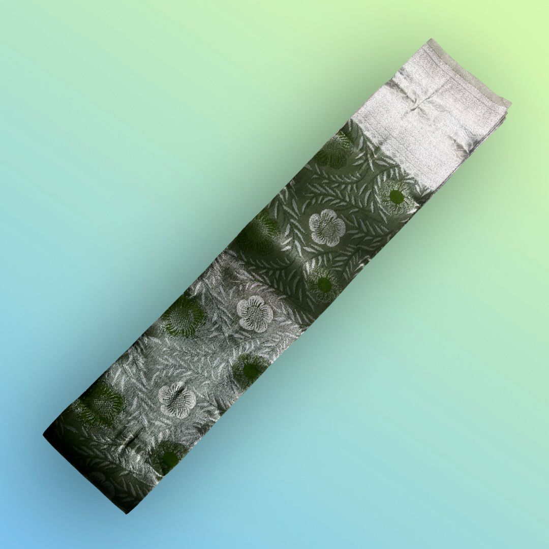 "Exquisite Green Kubera Pattu Saree with Silver Zari Weave"