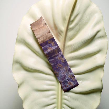 "Graceful Kuberapattu: Light Purple Body with Peach Border and Gold Zari"