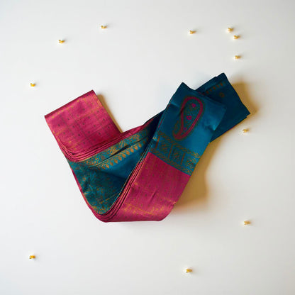 "Charming Kuberapattu: Pink Body with Teal and Paisley Zari Accents"