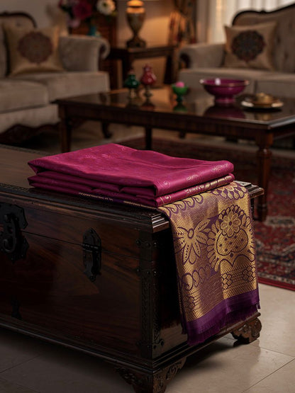 "Regal Kuberapattu: Pink Body with Purple Border, Copper Zari, and Green Pallu"
