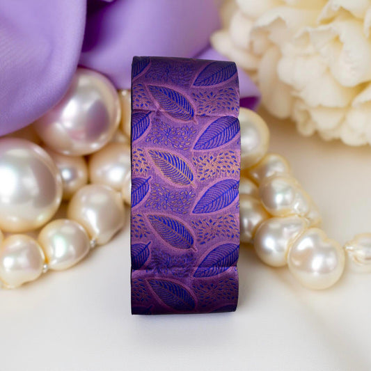 ''Regal Navy Blue & Violet Kubera Pattu Saree with Copper Zari Leaf Motifs"