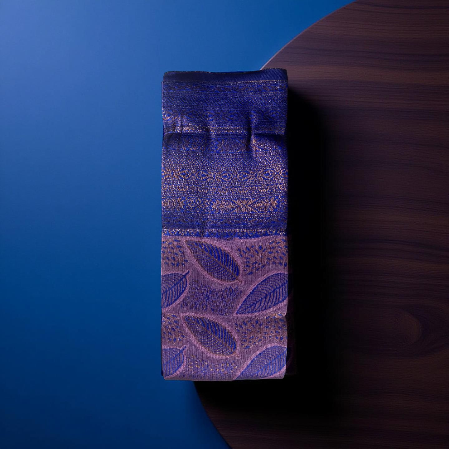 ''Regal Navy Blue & Violet Kubera Pattu Saree with Copper Zari Leaf Motifs"