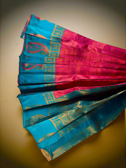 "Charming Kuberapattu: Pink Body with Teal and Paisley Zari Accents"