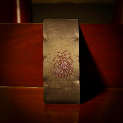 Elegant Kubera Pattu Saree: Khaki Body with Intricate Leaf Design & Burgundy Border