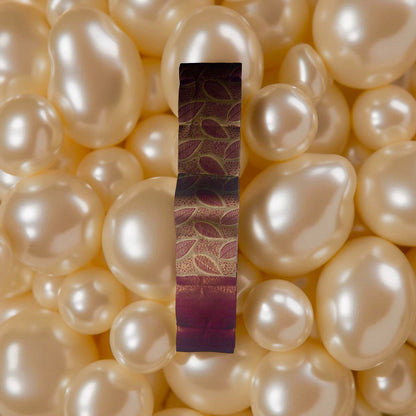 Elegant Kubera Pattu Saree: Khaki Body with Intricate Leaf Design & Burgundy Border